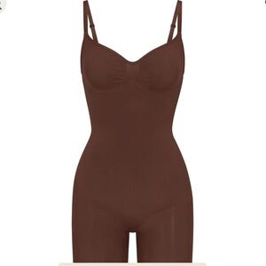 SKIMS SEAMLESS SCULPT MID THIGH BODYSUIT, in the color brown cocoa.